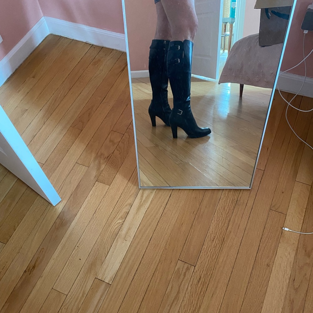 Designer boots by Ralph Lauren. They were worn 3 times.